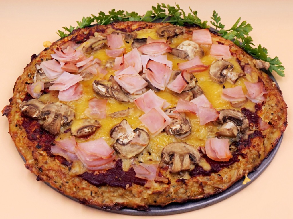 Cauliflower crust pizza with ham and mushrooms recipe