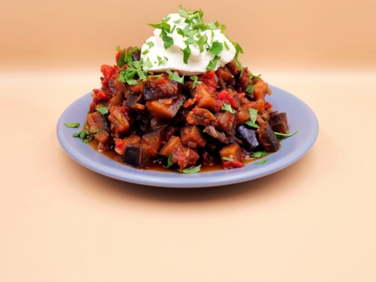 Stewed eggplant in tomatoes with yogurt recipe