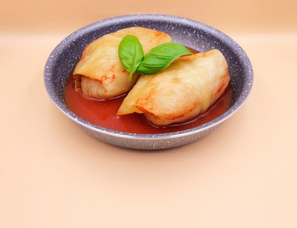 Stuffed cabbage rolls with meat and rice in tomato sauce recipe