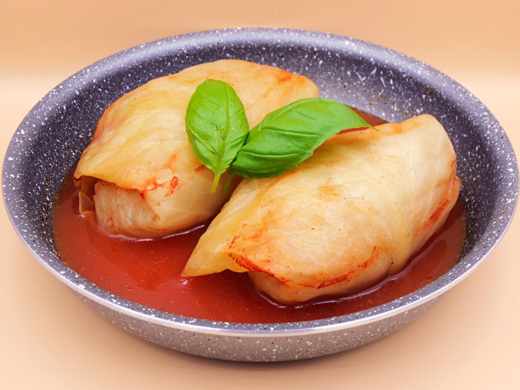 Stuffed cabbage rolls with meat and rice in tomato sauce recipe